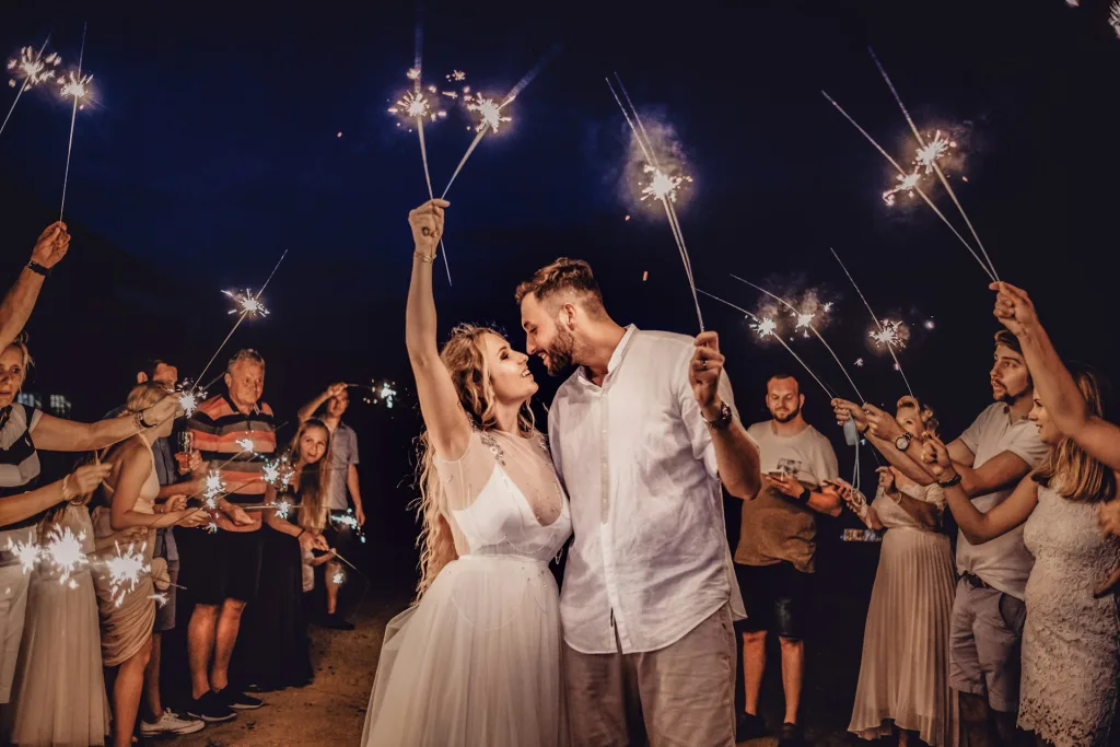 https://unsplash.com/photos/man-in-white-dress-shirt-holding-woman-in-white-dress-R0B0AnOw0Kg Photo by Victorian Priessntiz on Unsplash
