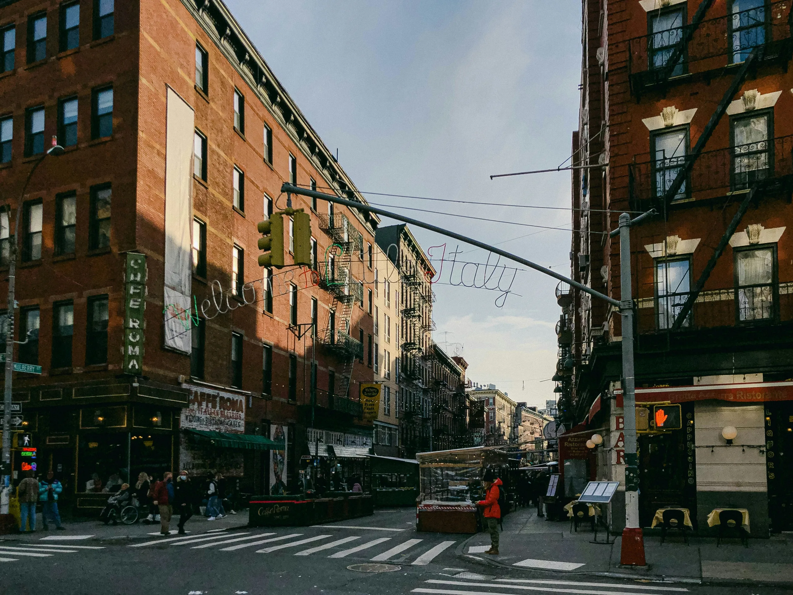 https://unsplash.com/photos/a-busy-city-street-with-people-crossing-the-street-Q-u0rL6iEbo