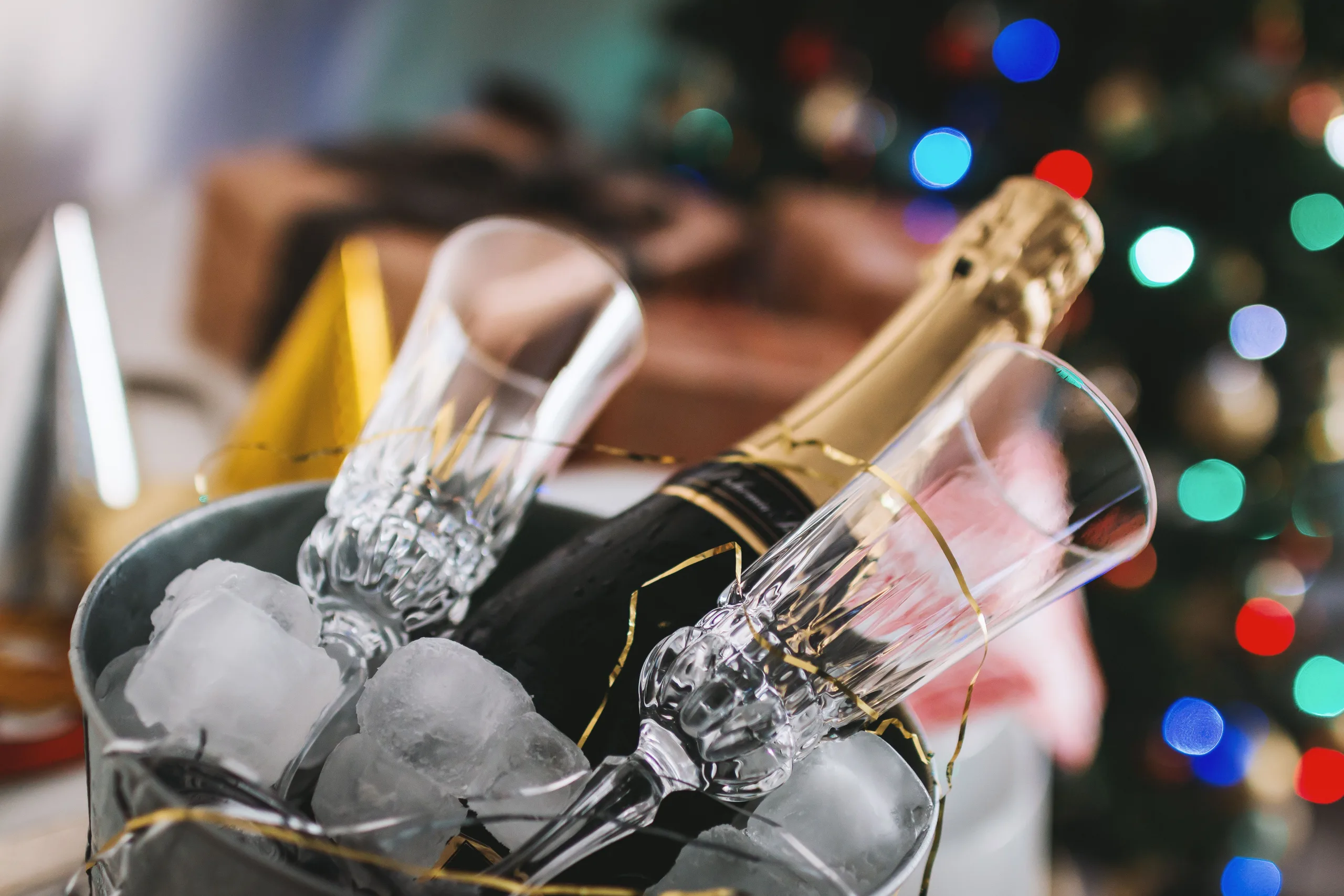 Photo by JESHOOTS.com: https://www.pexels.com/photo/selective-focus-photography-of-brown-labeled-bottle-and-two-clear-glass-champagne-flutes-834896/