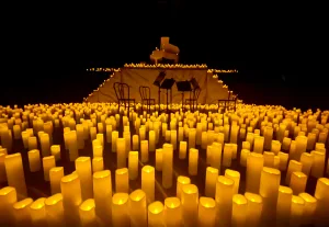 https://www.pexels.com/photo/stage-full-of-candles-13084352/