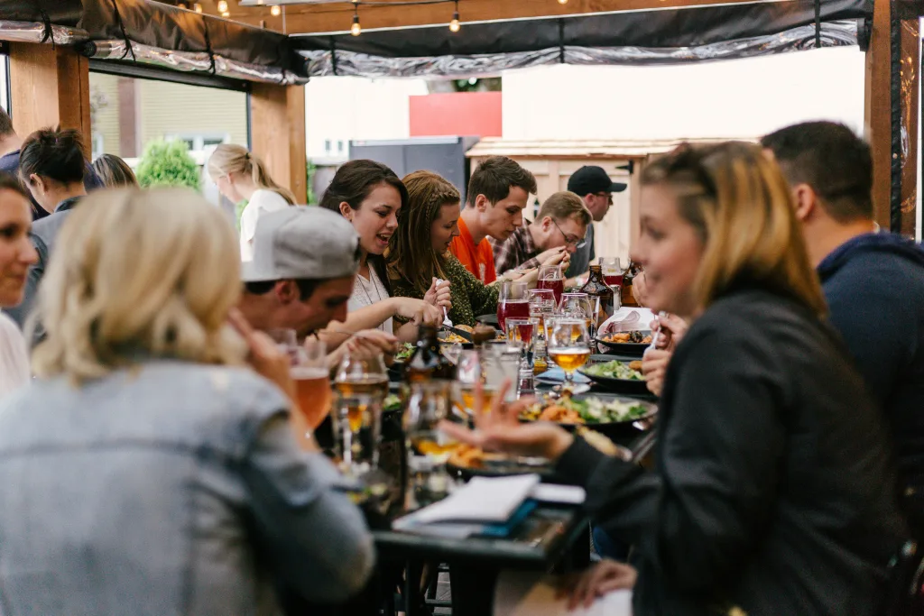 https://unsplash.com/photos/people-sitting-in-front-of-table-talking-and-eating-W3SEyZODn8U
