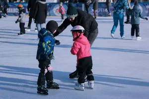 https://unsplash.com/photos/2-children-in-red-jacket-and-black-pants-playing-ice-hockey-mNLTL_8IU3g